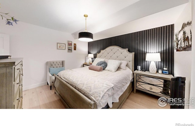 2790 Heron Lakes Pkwy, Berthoud, CO 80513 - bedroom featuring wood finished floors and baseboards