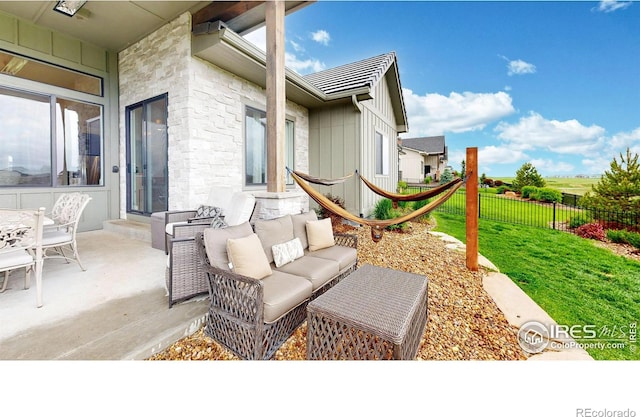 2790 Heron Lakes Pkwy, Berthoud, CO 80513 - view of patio / terrace with an outdoor living space