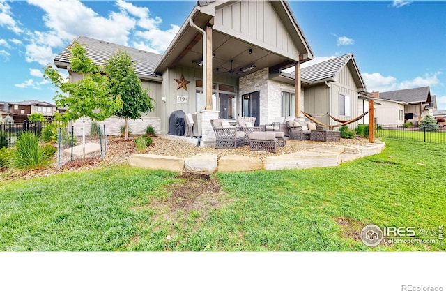 2790 Heron Lakes Pkwy, Berthoud, CO 80513 - back of house featuring an outdoor living space, ceiling fan, a patio area, and board and batten siding