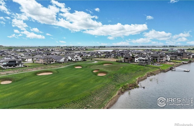 2790 Heron Lakes Pkwy, Berthoud, CO 80513 - aerial perspective of suburban area featuring a golf course and a nearby body of water