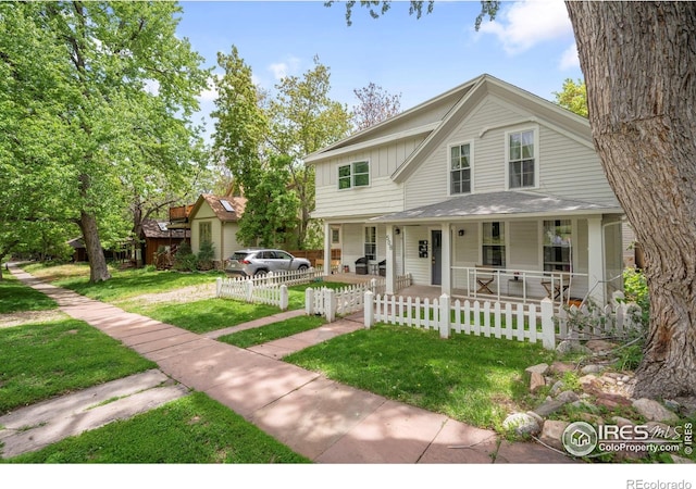 508 Pearl St, Boulder, CO 80302 - view of front of property featuring covered porch and board and batten siding