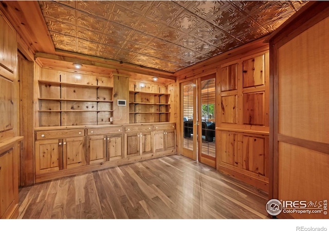 172 Tall Pine Ln, Boulder, CO 80302 - unfurnished office with an ornate ceiling, wood walls, and light wood finished floors