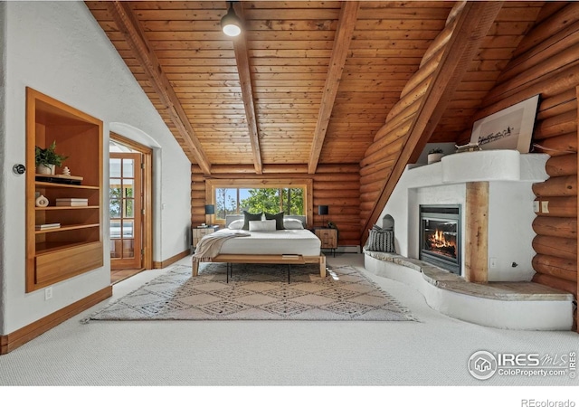 172 Tall Pine Ln, Boulder, CO 80302 - bedroom featuring log walls, carpet, a glass covered fireplace, wooden ceiling, and baseboards