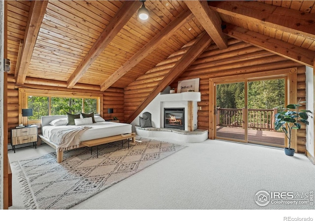 172 Tall Pine Ln, Boulder, CO 80302 - bedroom featuring access to outside, wood ceiling, rustic walls, carpet floors, and a glass covered fireplace