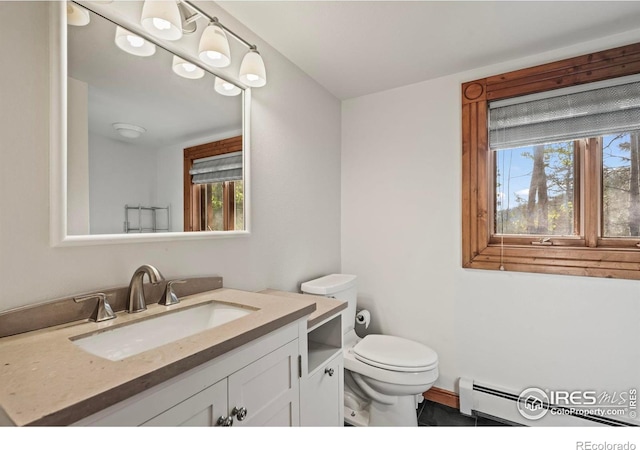 172 Tall Pine Ln, Boulder, CO 80302 - bathroom with toilet, vanity, and a baseboard radiator