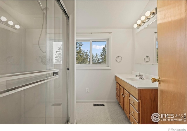 172 Tall Pine Ln, Boulder, CO 80302 - bathroom featuring vanity, a shower stall, and baseboards