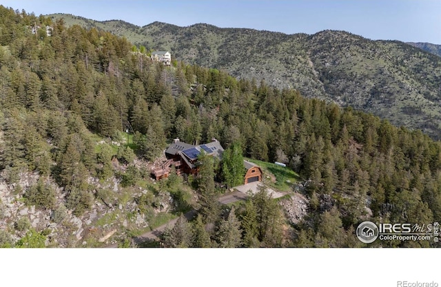 172 Tall Pine Ln, Boulder, CO 80302 - view of mountain backdrop featuring a heavily wooded area