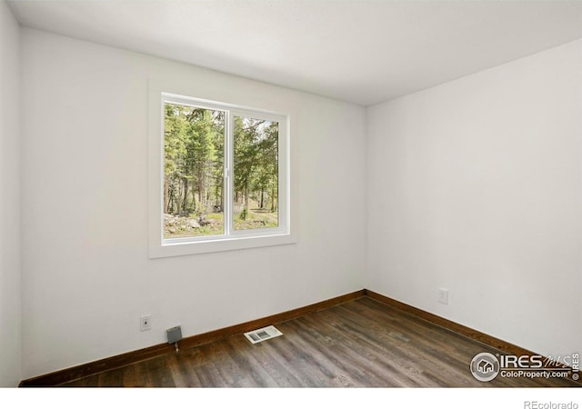 90 California Gulch Rd, Jamestown, CO 80455 - spare room featuring dark wood-style flooring and baseboards