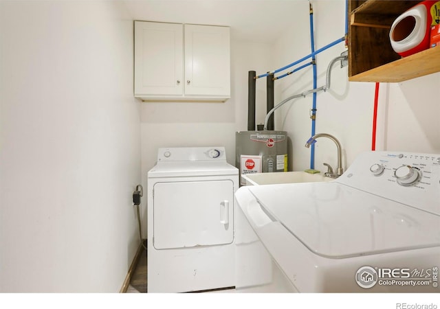90 California Gulch Rd, Jamestown, CO 80455 - laundry room with washing machine and clothes dryer, electric water heater, and cabinet space