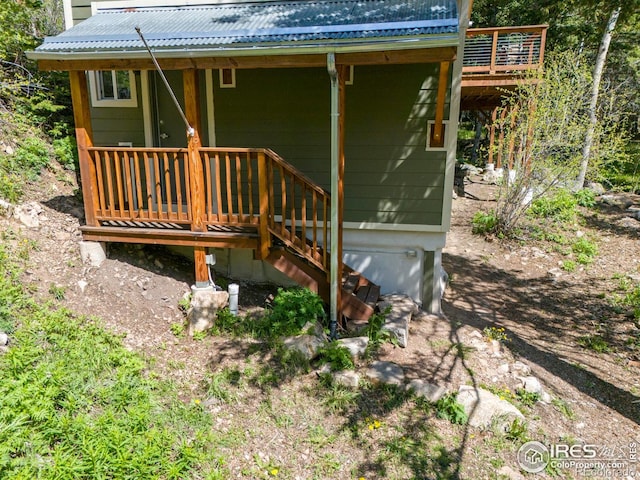 90 California Gulch Rd, Jamestown, CO 80455 - view of front of home featuring a metal roof and a deck