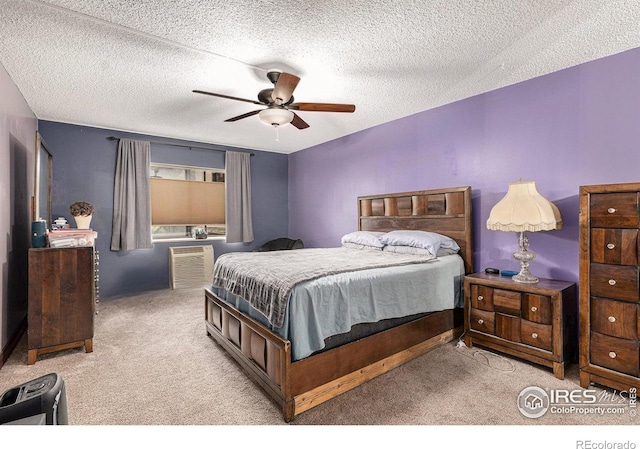 14000 E Linvale Pl Unit 210, Aurora, CO 80014 - bedroom featuring carpet, a textured ceiling, and a ceiling fan