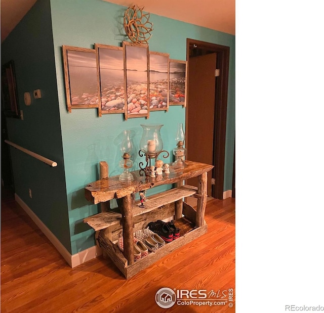 14000 E Linvale Pl Unit 210, Aurora, CO 80014 - bar featuring wood finished floors and baseboards