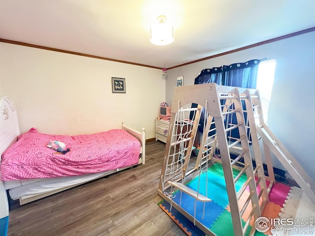 950 Big Thompson Ave Unit 2142, Estes Park, CO 80517 - bedroom with crown molding, wood finished floors, and baseboards