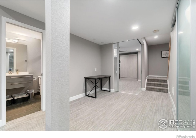 17805 Coral Burst St, Parker, CO 80134 - hallway with carpet, stairs, and baseboards