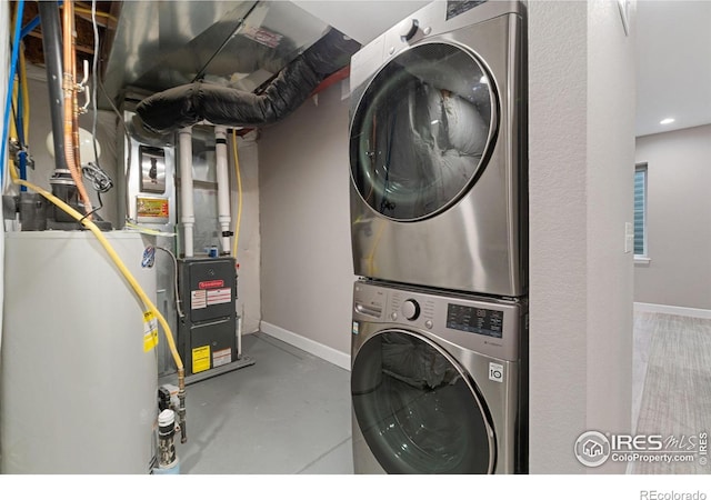 17805 Coral Burst St, Parker, CO 80134 - laundry room with estacked washer and dryer and baseboards