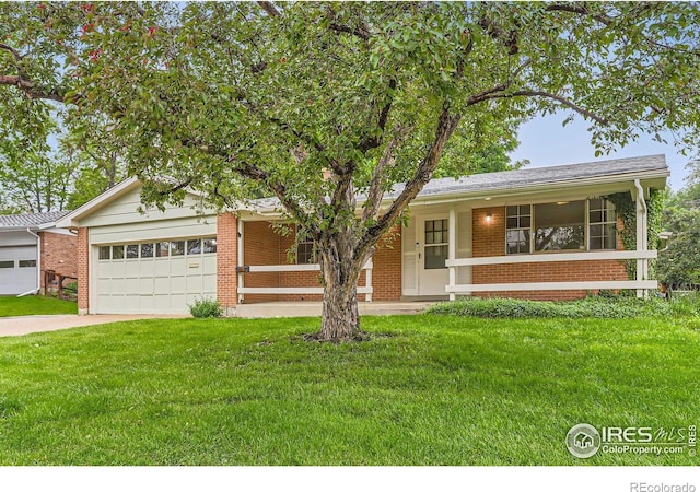 1025 Edinboro Dr, Boulder, CO 80305 - ranch-style house with an attached garage, brick siding, a front yard, driveway, and covered porch