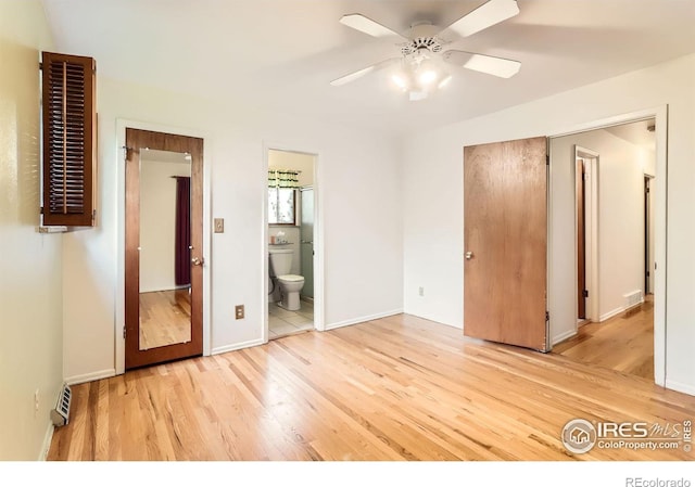 1025 Edinboro Dr, Boulder, CO 80305 - unfurnished bedroom featuring wood finished floors, ensuite bathroom, a ceiling fan, and baseboards