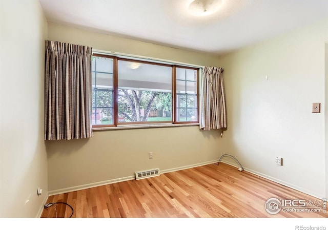 1025 Edinboro Dr, Boulder, CO 80305 - empty room featuring wood finished floors and baseboards