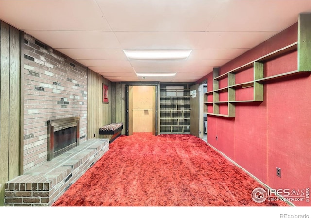 1025 Edinboro Dr, Boulder, CO 80305 - living area with a paneled ceiling, a brick fireplace, and carpet