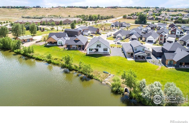 1769 Beachside Dr, Windsor, CO 80550 - aerial perspective of suburban area with a large body of water
