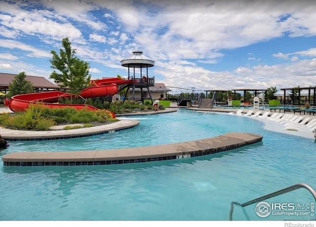 1769 Beachside Dr, Windsor, CO 80550 - community pool with a water slide