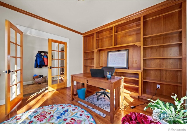 2005 Calico Ct, Longmont, CO 80503 - office space with french doors, crown molding, wood finished floors, and baseboards
