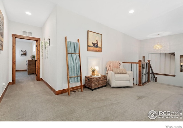 1646 Marbeck Dr, Windsor, CO 80550 - sitting room featuring an upstairs landing, carpet flooring, baseboards, recessed lighting, and a chandelier