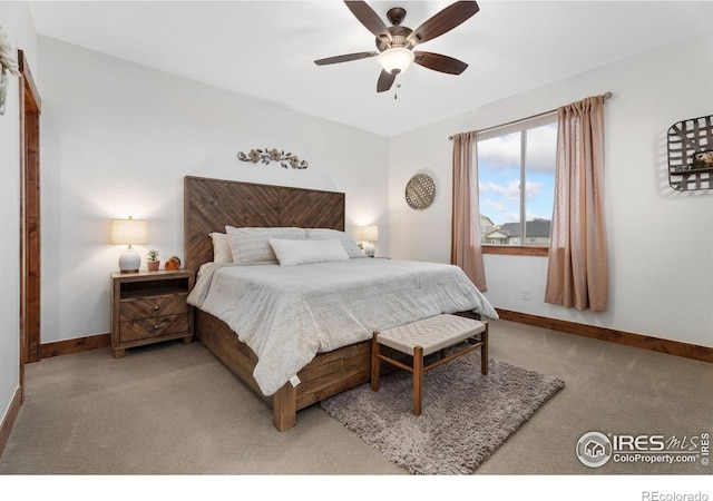 1646 Marbeck Dr, Windsor, CO 80550 - carpeted bedroom with baseboards and a ceiling fan
