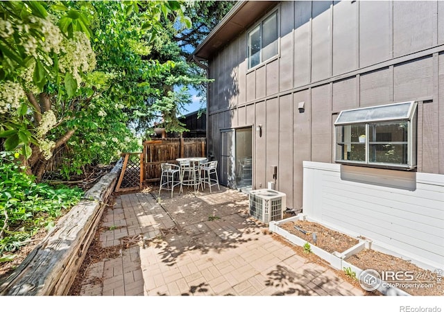 2840 W 21st St Unit 14, Greeley, CO 80634 - view of patio with central air condition unit and outdoor dining area