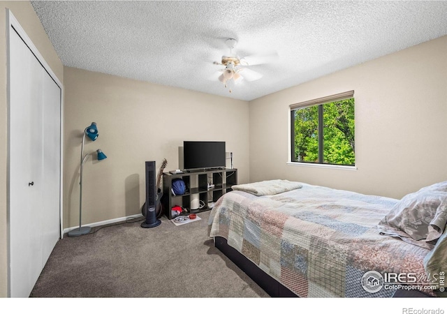 2840 W 21st St Unit 14, Greeley, CO 80634 - bedroom featuring carpet, a closet, ceiling fan, a textured ceiling, and baseboards