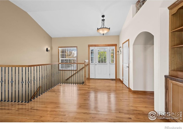29 Pioneer Pl, Eaton, CO 80615 - entrance foyer featuring light wood-style floors and vaulted ceiling