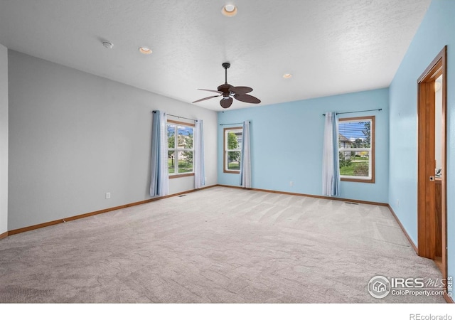 29 Pioneer Pl, Eaton, CO 80615 - carpeted empty room featuring baseboards, ceiling fan, recessed lighting, and a textured ceiling