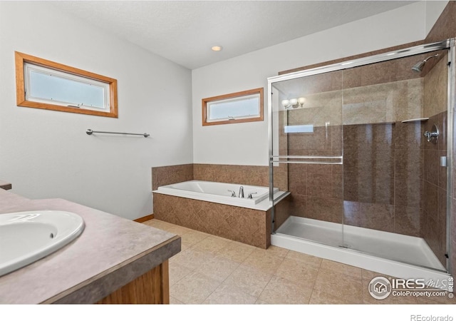 29 Pioneer Pl, Eaton, CO 80615 - bathroom with a bath, a stall shower, vanity, and tile patterned flooring
