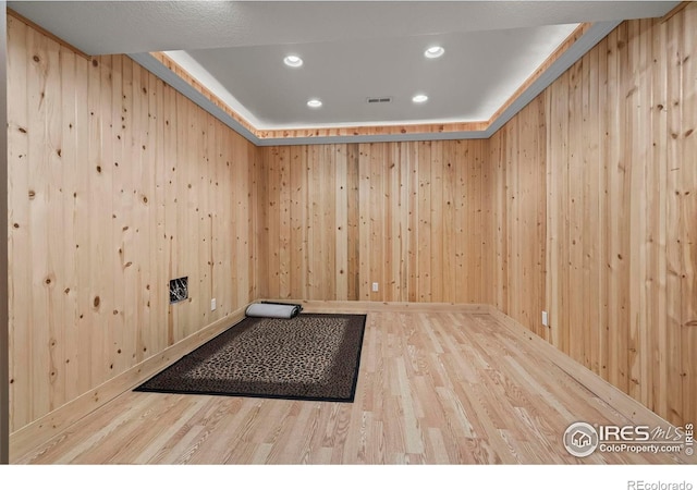 29 Pioneer Pl, Eaton, CO 80615 - spare room with wood finished floors, recessed lighting, and wooden walls