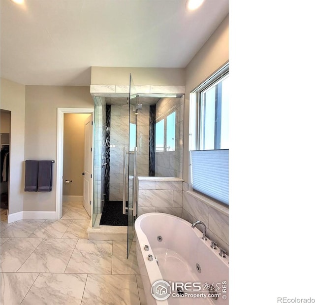 4236 Carroway Seed Ct, Johnstown, CO 80534 - full bath with a tub with jets, a stall shower, marble finish floors, baseboards, and recessed lighting