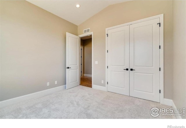 4236 Carroway Seed Ct, Johnstown, CO 80534 - unfurnished bedroom with lofted ceiling, carpet, baseboards, a closet, and recessed lighting