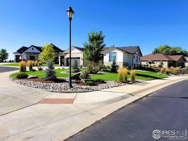 4236 Carroway Seed Ct, Johnstown, CO 80534 - view of front of property with a front lawn and a residential view