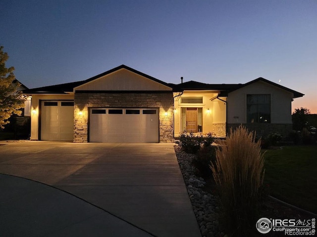 4236 Carroway Seed Ct, Johnstown, CO 80534 - single story home with stone siding, an attached garage, and driveway