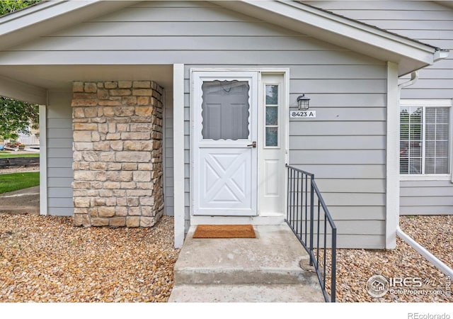 8423 Everett Way Unit A, Arvada, CO 80005 - view of exterior entry featuring stone siding