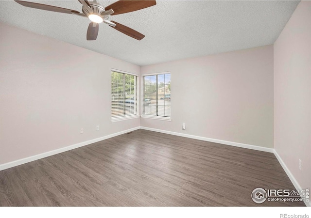 8423 Everett Way Unit A, Arvada, CO 80005 - spare room featuring a textured ceiling, wood finished floors, a ceiling fan, and baseboards