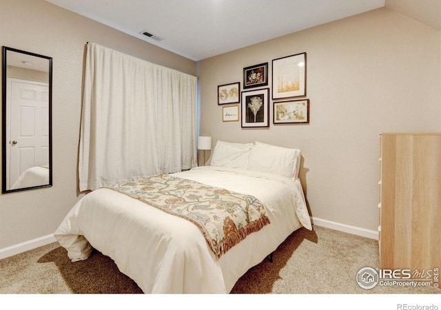 1240 Wren Ct Unit D, Longmont, CO 80501 - bedroom featuring baseboards and carpet floors