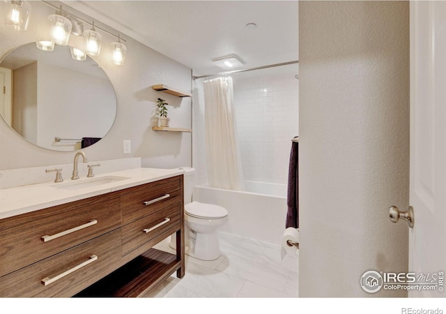 1240 Wren Ct Unit D, Longmont, CO 80501 - bathroom with vanity, toilet, shower / bath combo with shower curtain, and marble finish flooring