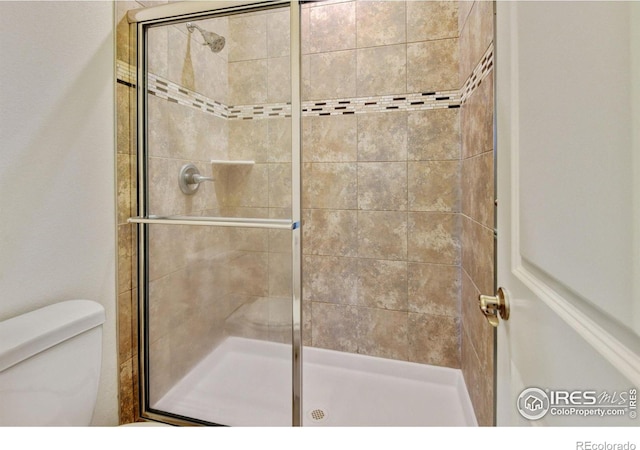 1240 Wren Ct Unit D, Longmont, CO 80501 - full bath featuring a shower stall and toilet