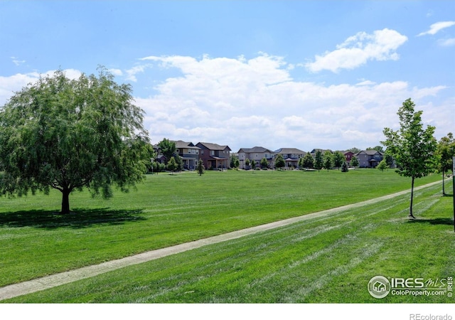 1240 Wren Ct Unit D, Longmont, CO 80501 - view of community featuring a lawn and a residential view