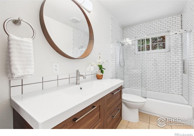 4329 Main St, Timnath, CO 80547 - full bath featuring vanity, tile patterned flooring, toilet, and combined bath / shower with glass door
