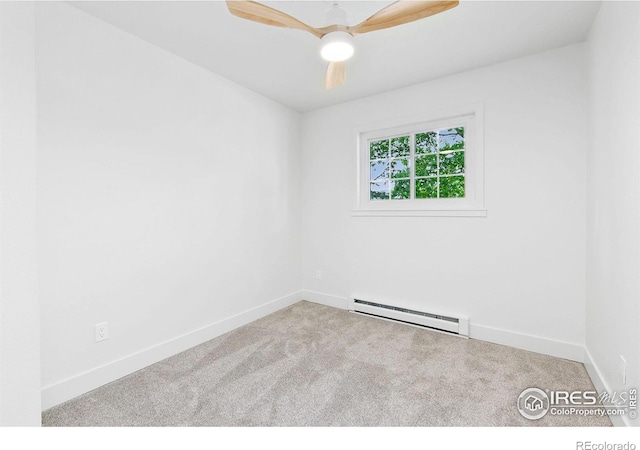 4329 Main St, Timnath, CO 80547 - spare room with a baseboard heating unit, carpet flooring, baseboards, and a ceiling fan