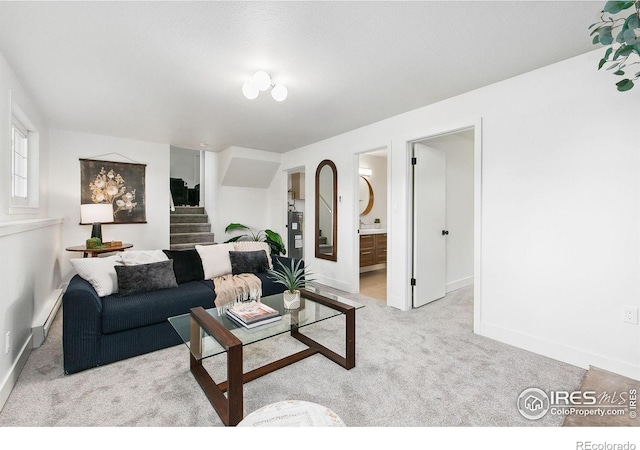 4329 Main St, Timnath, CO 80547 - living area with stairs, carpet flooring, and baseboards