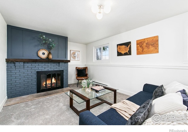 4329 Main St, Timnath, CO 80547 - living room with carpet floors, baseboards, and a fireplace
