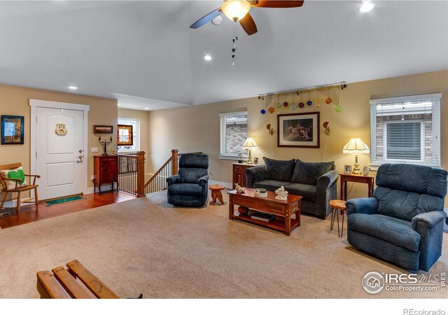 2126 Friar Tuck Ct, Fort Collins, CO 80524 - living room with carpet floors, lofted ceiling, plenty of natural light, recessed lighting, and a ceiling fan
