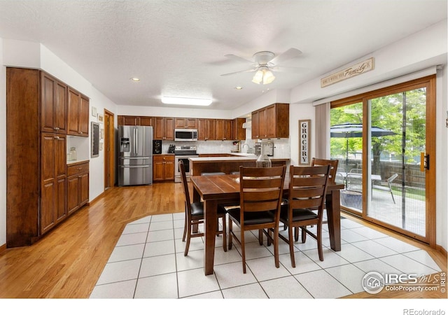 806 51st Ave, Greeley, CO 80634 - dining area featuring a ceiling fan, light wood-style floors, and recessed lighting